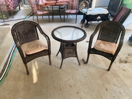 TWO PATIO CHAIRS AND A TABLE