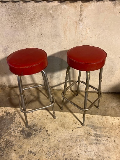 2 red bar stools