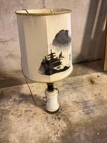 Lamp with painted shade.