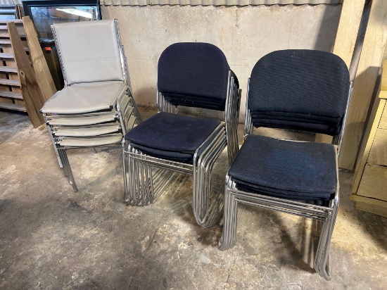 14 Blue stackable chairs. (One with corner torn) 5 Gray stackable chairs