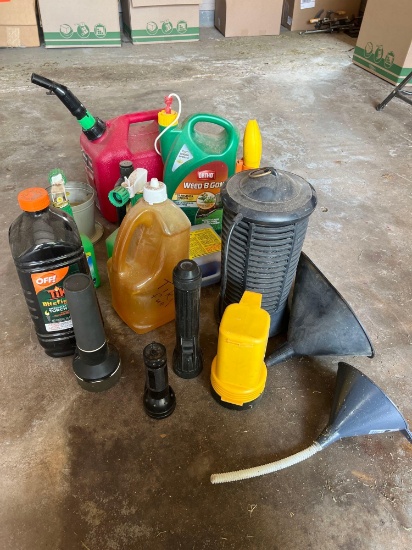 Box of Misc gas can, tiki torch fluid, and flashlights