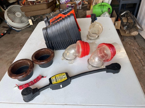 SURGE GUARD LUG, SIDE WINDER, AND SEWER HOSE ATTACHMENTS...
