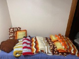 10 AFGHAN THROWS AND TWO PILLOWS ??????? USED LIKE NEW CONDITION
