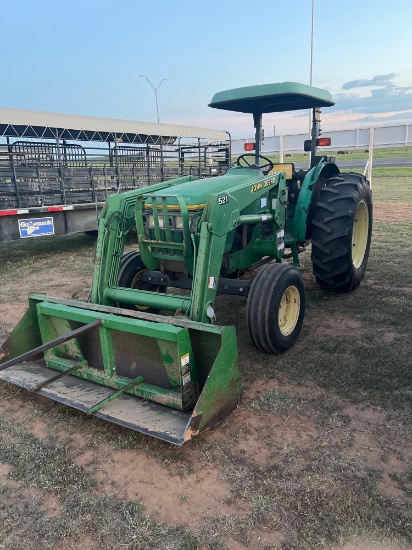 John Deere 5300 Tractor open station with a canopy... has a 521 John Deere Loader with Bucket and Ha