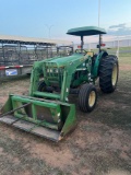 John Deere 5300 Tractor open station with a canopy... has a 521 John Deere Loader with Bucket and Ha
