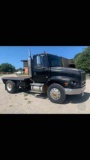 1998 Frieghtliner...with a Rockwell 9 speed transmission and a Mll cummings motor steer tires 10k on