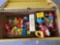 yellow toy box with Fisher Price Circus Train toy set and other toys see photos