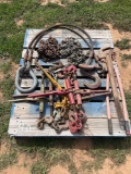 PALLET WITH CHAINS 6 BOOMERS 1 BOLT CUTTER 1 PIPE WRENCH 1 CABLE SLING