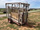 WW PORTABLE CATTLE WORKING CHUTE COMES READY TO USE WITH WOOD NEW TIRES... REPACKED BEARINGS