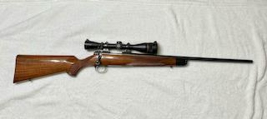 KIMBER MODEL 84 .221 BA W/ LEUPOLD SCOPE... SERIAL #: FB338B