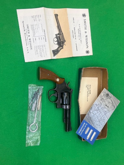 Make: Smith & Wesson Year: 1977 Serial # - Firearms: 18K6818 Caliber: .22 MAG Barrel Length: 4 INCH