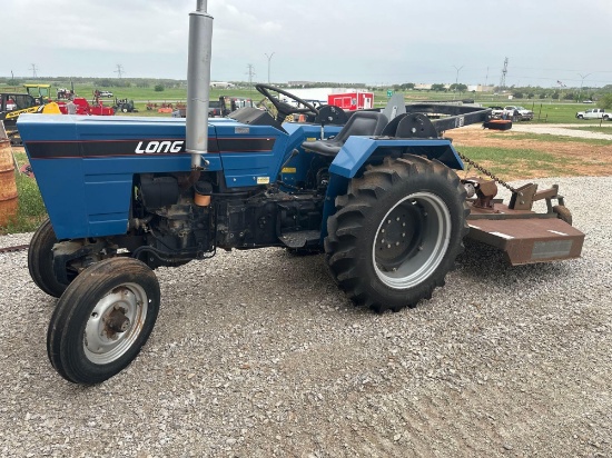 LONG BLUE TRACTOR WITH 5 FT BRUSH HOG