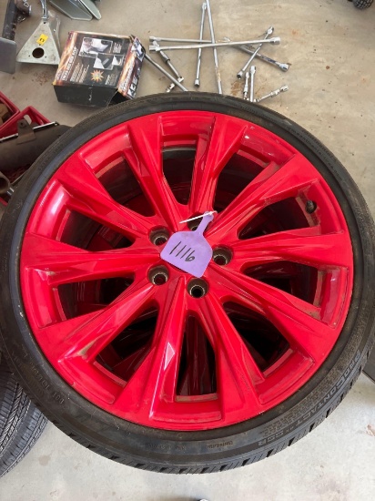 RED RIMS WITH NEW TIRES