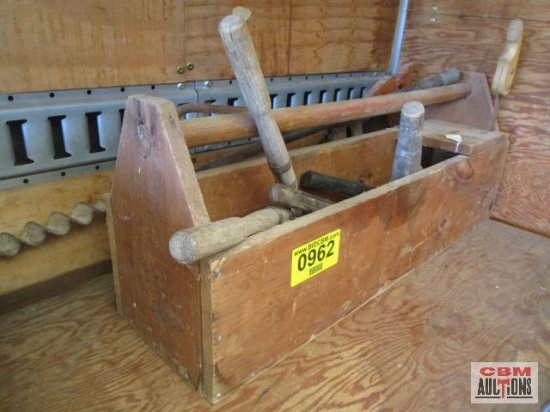 Wooden toolbox with mixed hand tools