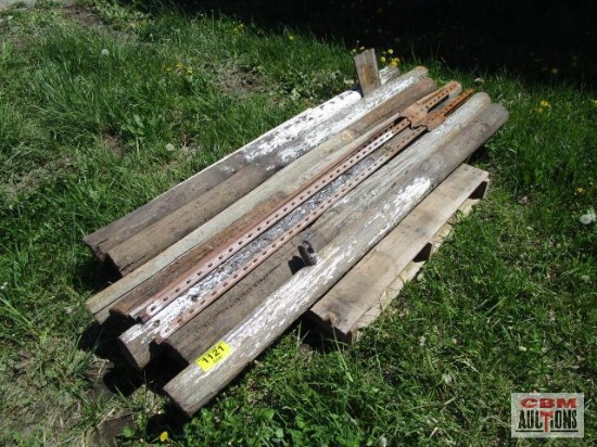 7 Wood fence posts and 3 steel posts