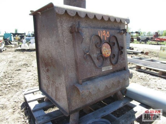 The Earth Stone wood stove with pipe