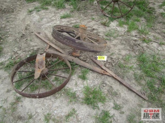 2- Antique steel wheels and drawbar