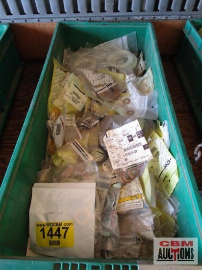 Large assortment of Case New Holland washers new in packages with part numbers. TOTE NOT INCLUDED