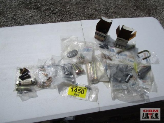 Large assortment of Case New Holland bolts new in packages with part numbers. TOTE NOT INCLUDED