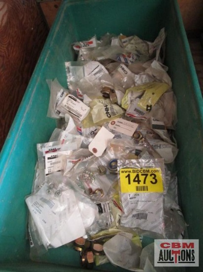 Large assortment of Case New Holland nuts, new in packages with part numbers. TOTE NOT INCLUDED