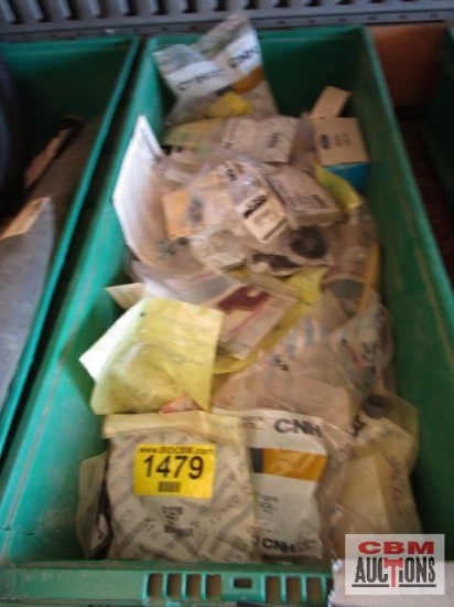 Large assortment of Case New Holland parts, new in packages with part numbers. TOTE NOT INCLUDED