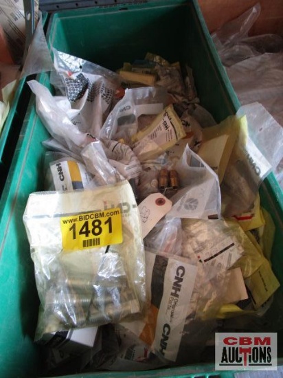Large assortment of Case New Holland bolts new in packages with part numbers. TOTE NOT INCLUDED