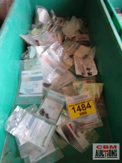 Large assortment of Case New Holland screws new in packages with part numbers. TOTE NOT INCLUDED
