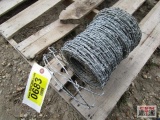 Partial roll of barbwire