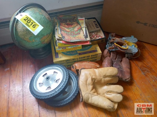 Vintage baseball gloves, roller skates, wheels, pre WWII globe, and games