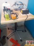 Table with metal base with casters, 25