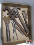 Large chisel, pipe wrenches, adjustable wrench, pliers, hammer *3