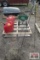 Gas cans, scotts spreader seeder, and metal wreath stand