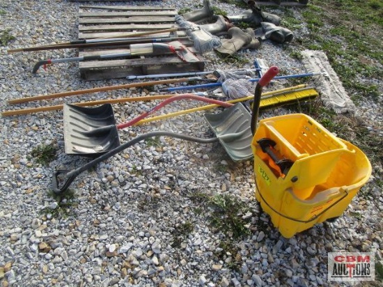 Assortment of hand tools including dust mops, snow shovels, wet mops and mop bucket, push brooms,