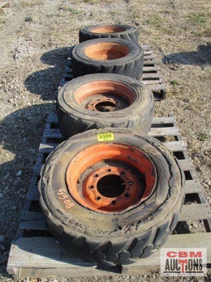 4 - Bobcat foam filled 10-16.5 tires mounted on wheels