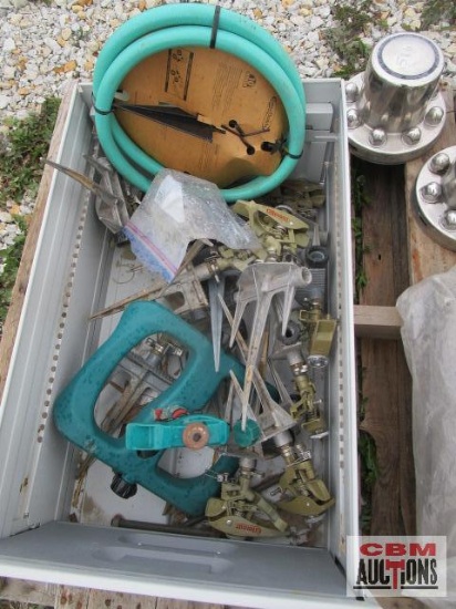 Lot of garden hose sprinklers and hose