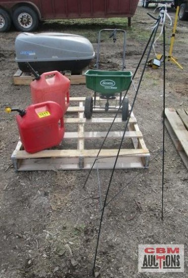 Gas cans, scotts spreader seeder, and metal wreath stand