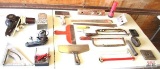 Heat Gun, Rafter Square, Sheet Rock Trowels, Hacksaw, Volt Meter