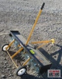 Yellow Pull Behind Lawn Aerator...
