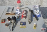 Sparks Plugs, Grease Gun, Delco Disturber Cap, Battery Cable End, 1984 Chevrolet Owners Manual
