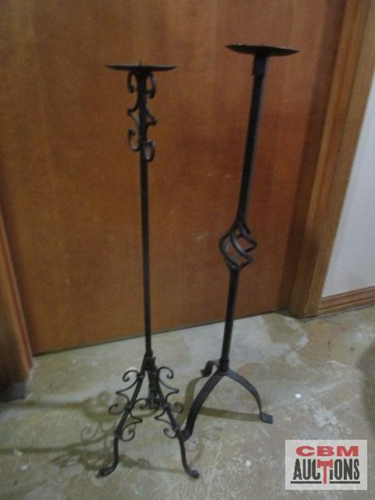 Tall black metal candle stands, 33