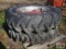 Pair of used tractor tires and wheels with some rust, one is 14.9-28, the other is 13.6-28