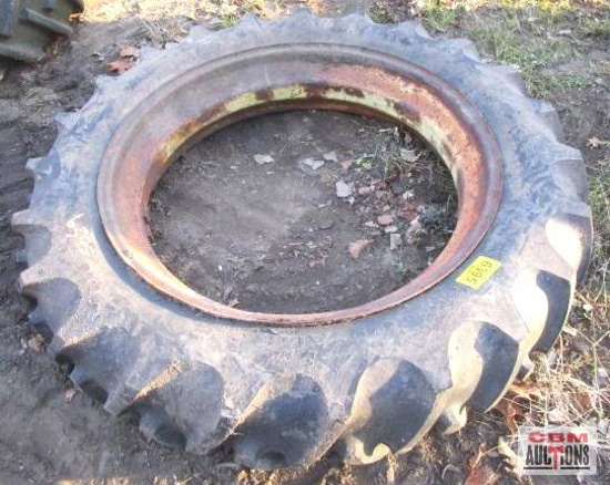 Rear tractor tire 12.4 -38 on rim