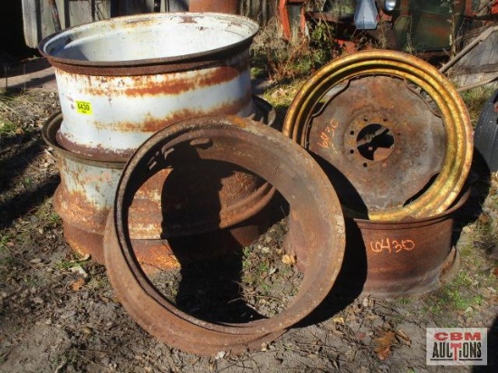 5 Assorted tractor tire rims great for fire pits and backyard projects