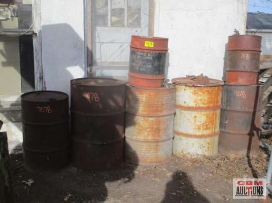 Assorted steel barrels with Vintage 15 gal Archer International special...transmission...