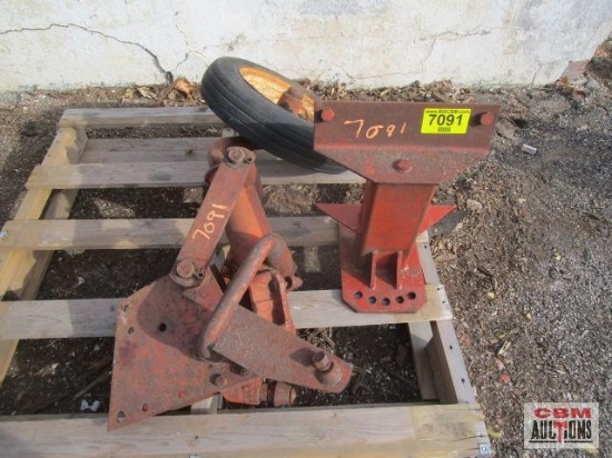 Plow tail wheel and bracket