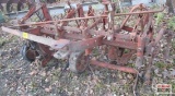 Field cultivator for scrap iron