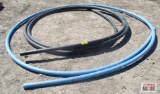 Partial Roll Black and Orange Plastic Pipe