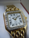 LADIES GENEVE 14KT GOLD DIAMOND BEZEL WHITE ROMAN WATCH