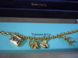 TIFFANY 18KT GOLD CHARM BRACELET - ETOILE DIAMOND HEART - JEWELED SUITCASE - ANGEL CHERUB - MOP OYST