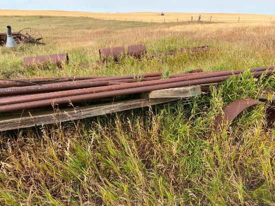 Quantity of Assorted Sized Steel Pipe on an Antique Steel Wheel Wagon